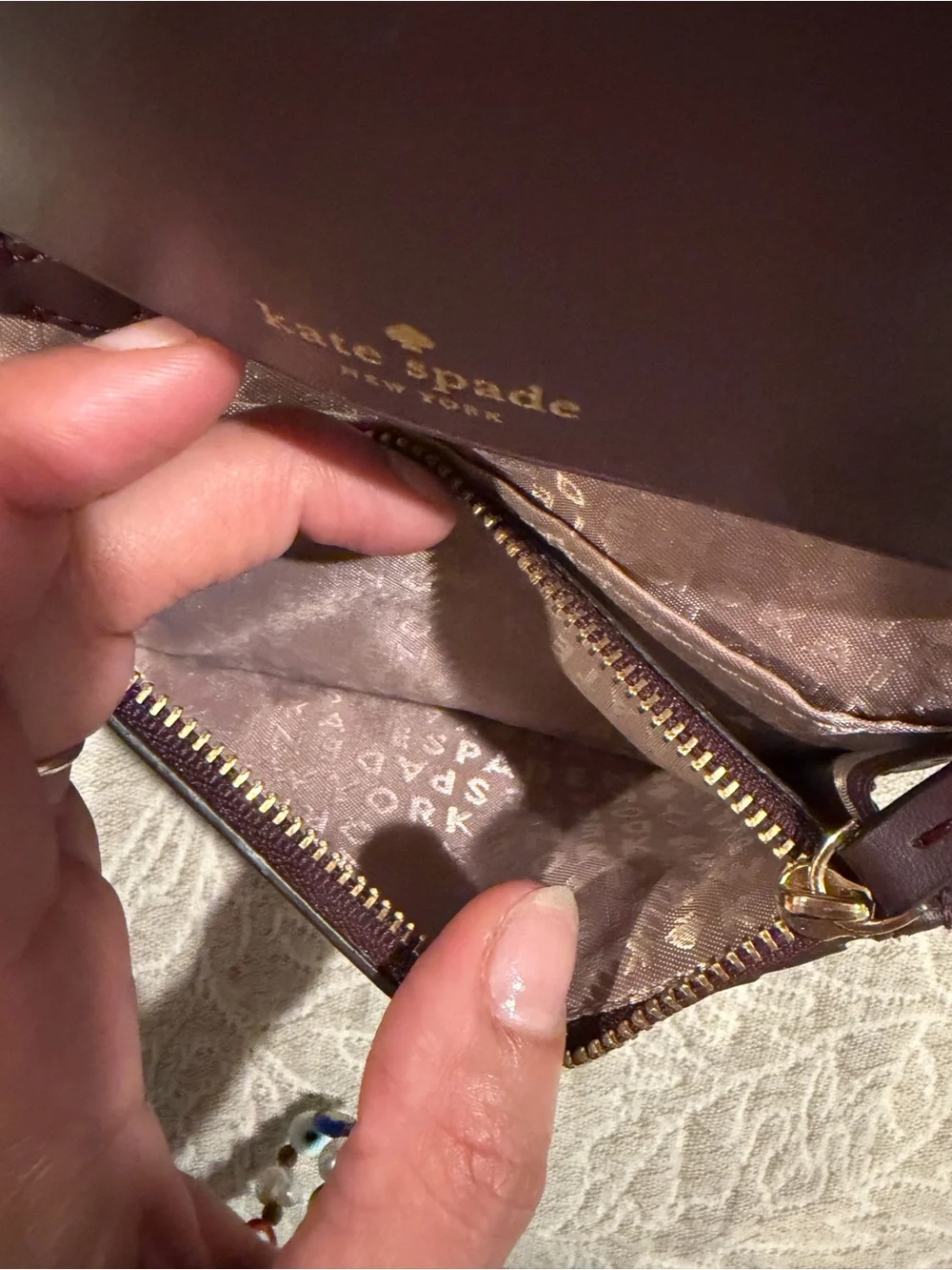 kate spade Plum Pebbled Leather Card Case with Gold Logo